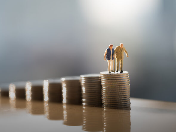 Concept,Of,Retirement,Planning.,Miniature,People:,Old,Couple,Figure,Standing