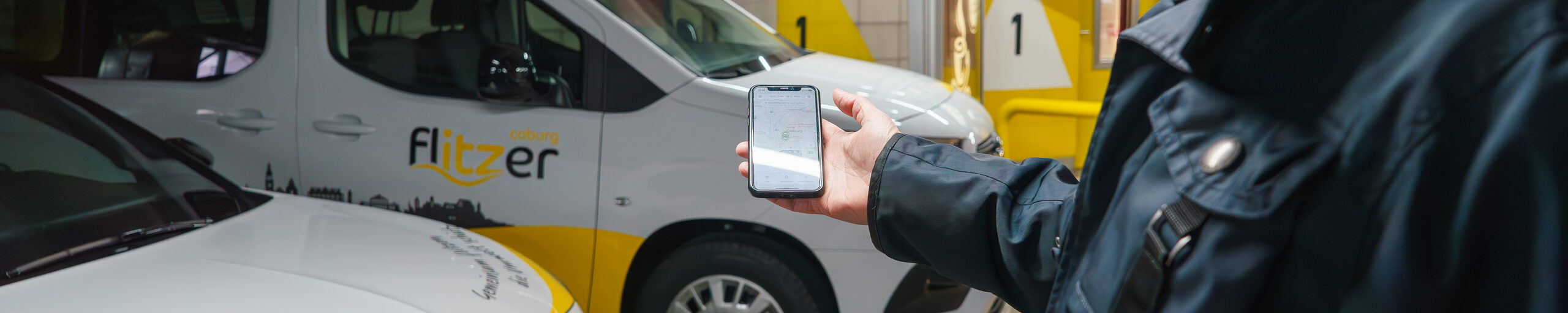 OB Dominik Sauerteig bucht einen Coburg Flitzer per App.