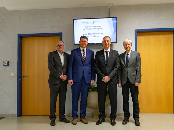 von links: Norbert Anders, Dominik Sauerteig, Nico Höllein, Thomas Engel bei der Amtseinführung von Nico Höllein als Schulleiter.