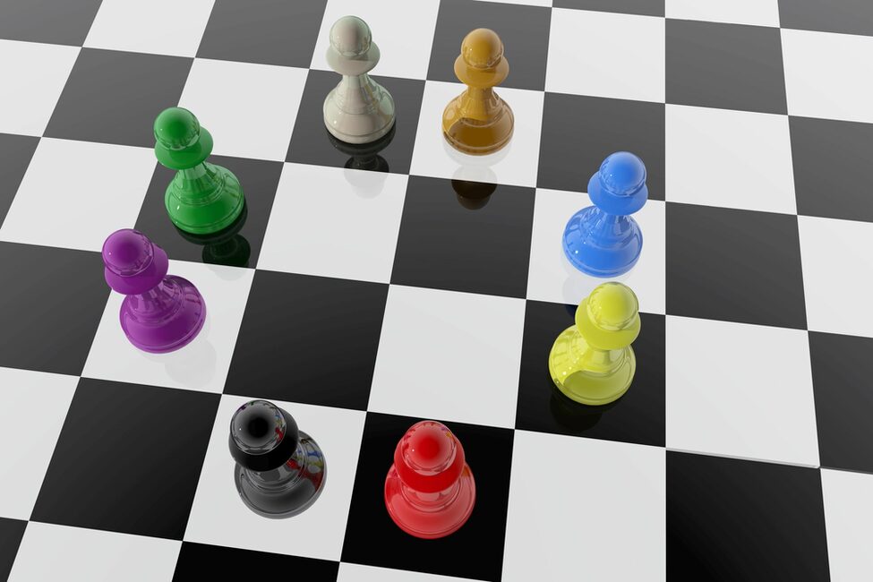 Chess pawns of different colors
